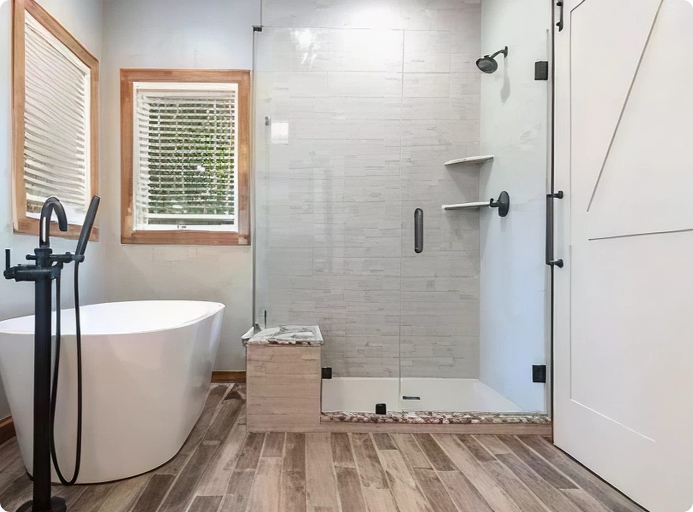 Modern bathroom with tub and shower.